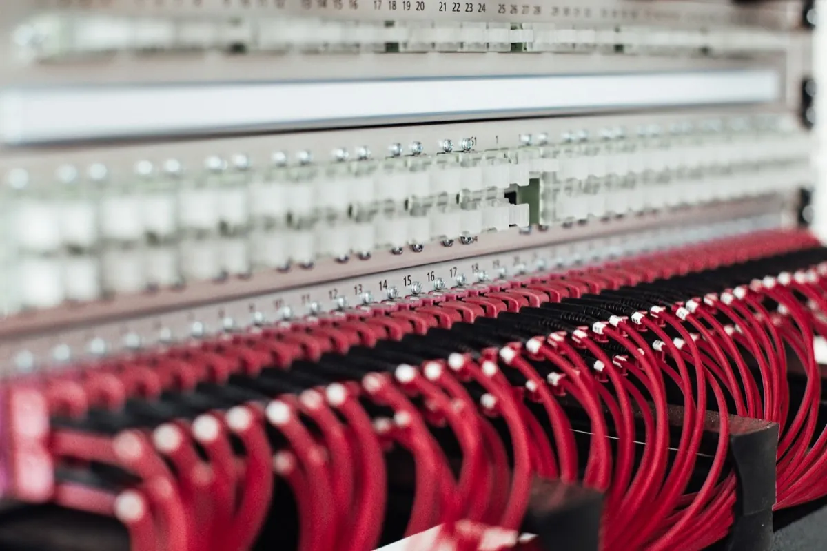 Neatly dressed patch leads terminated in a data hall panel