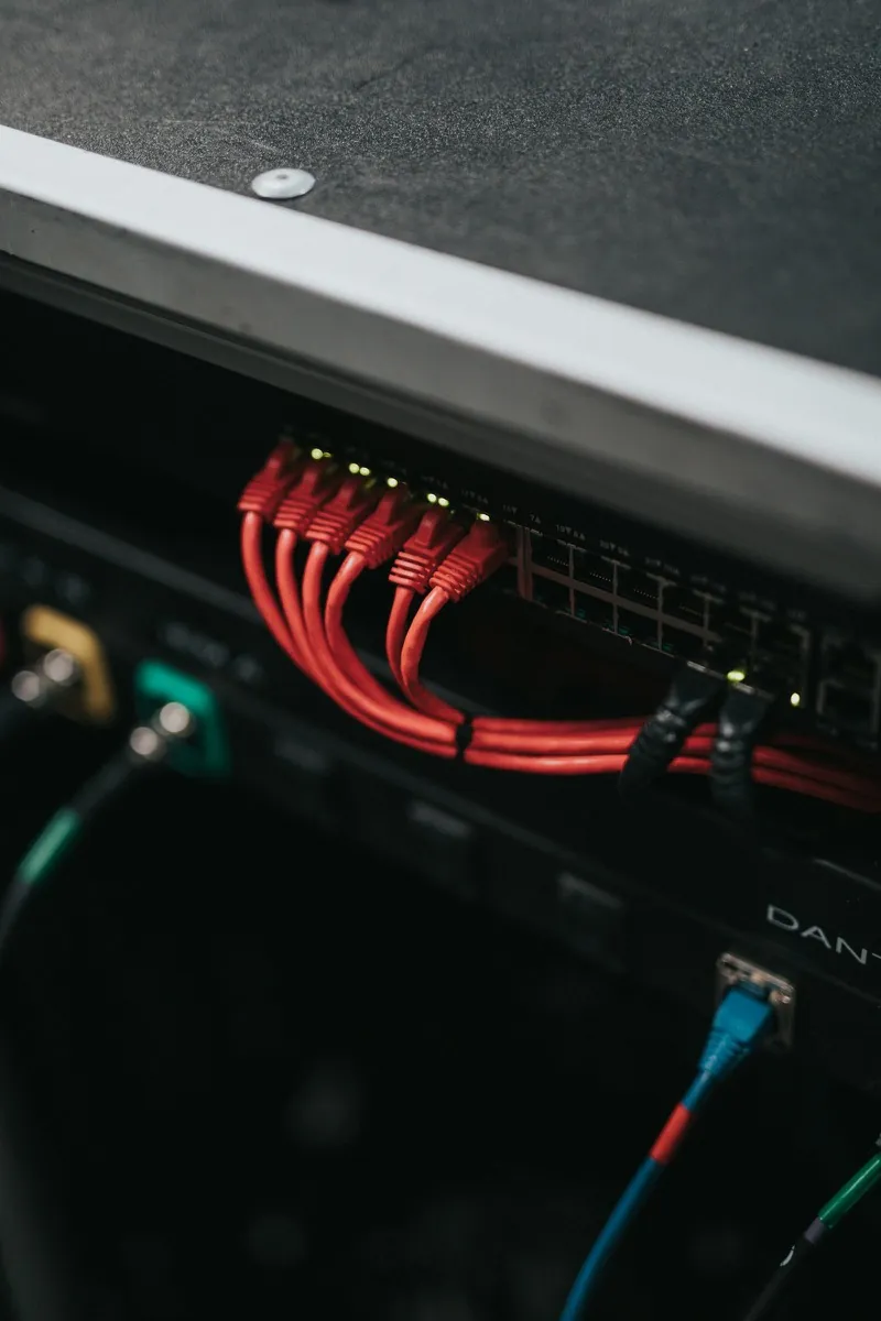Network switch with patch leads in a dark rack